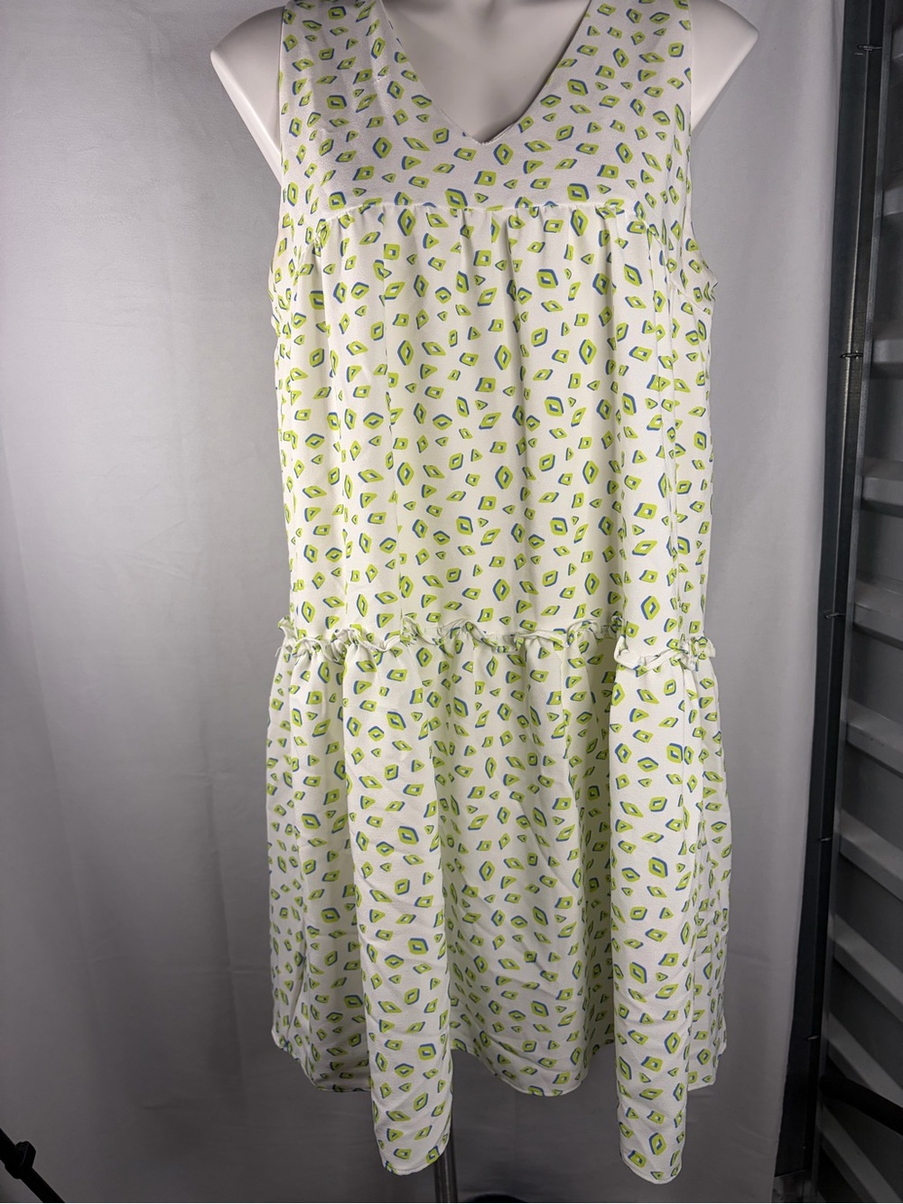 Sleeveless White Dress with Lime Geometric Print - Casual Summer Style